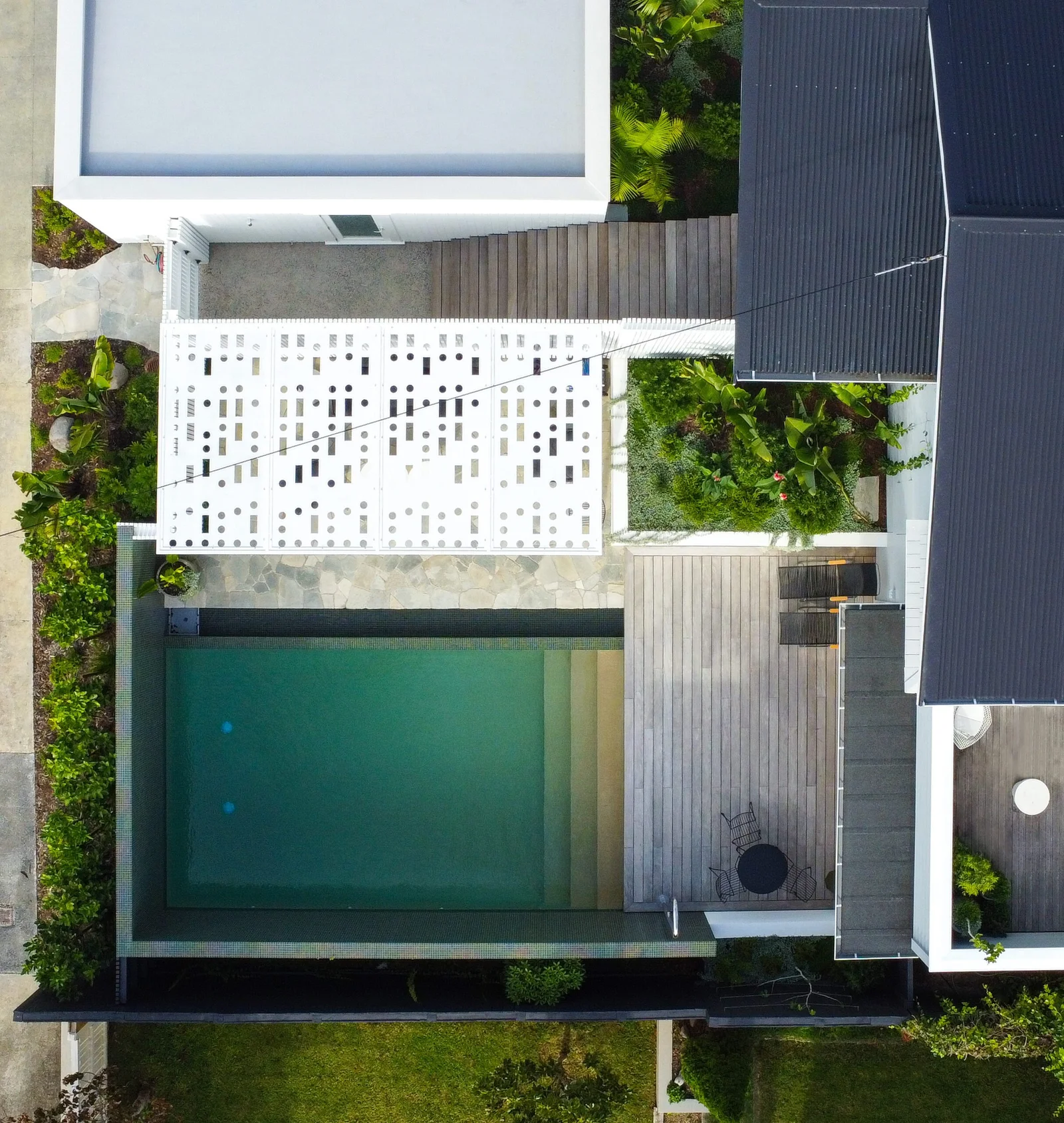 Aerial view of house with swimming pool