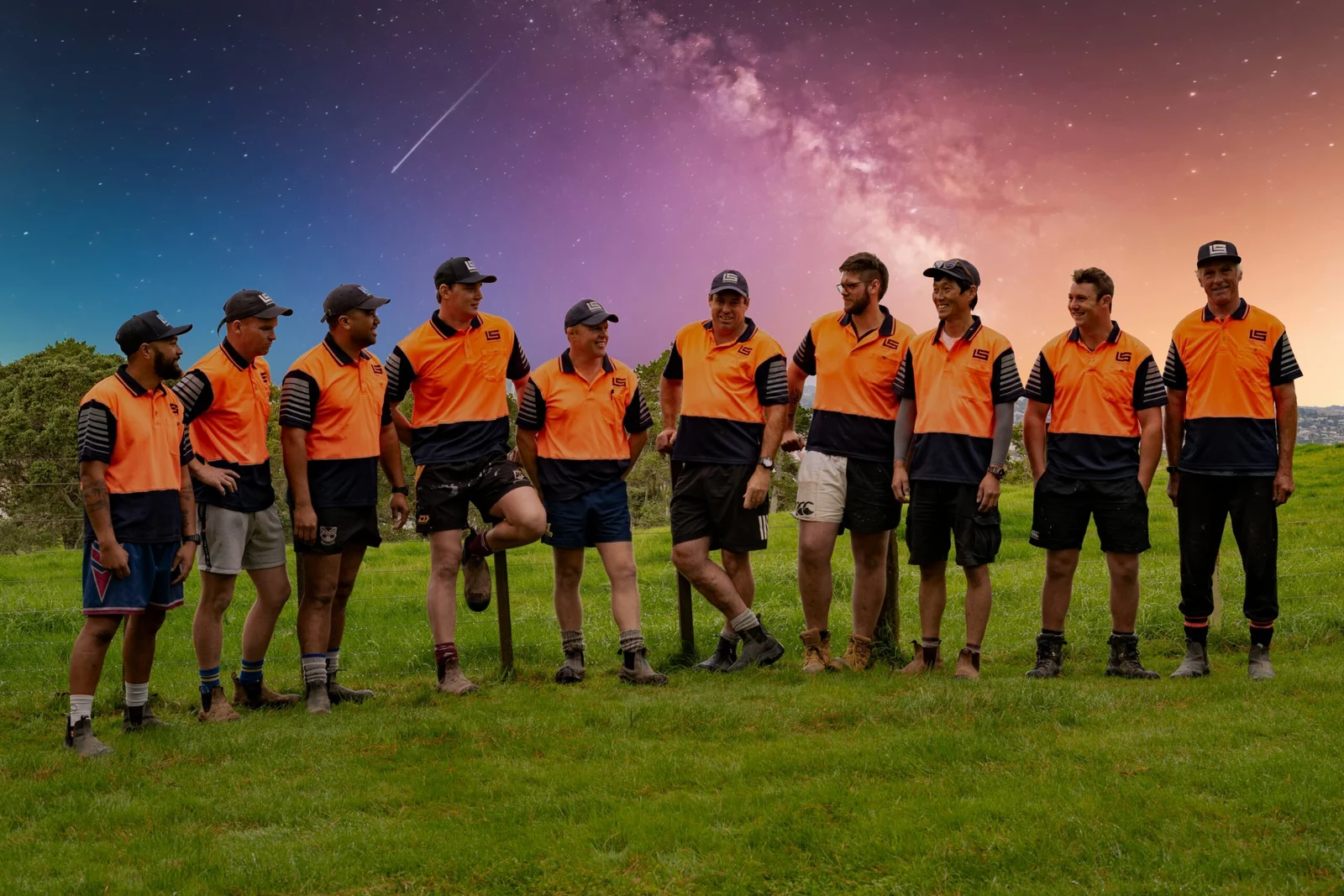Group of construction workers under starry sky