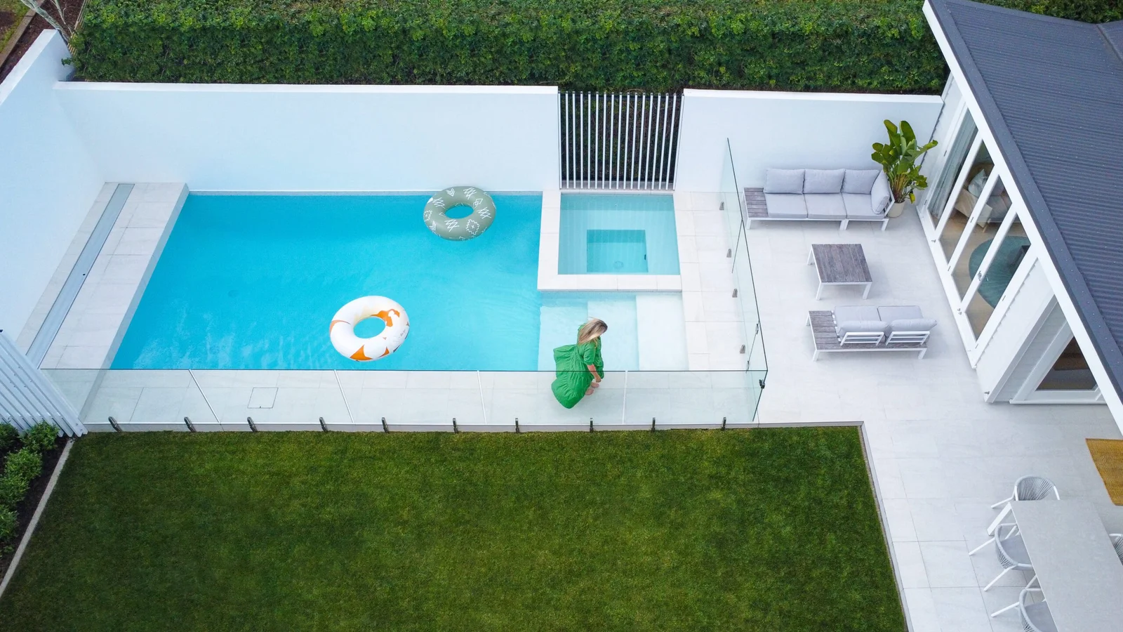 Aerial view of backyard with pool