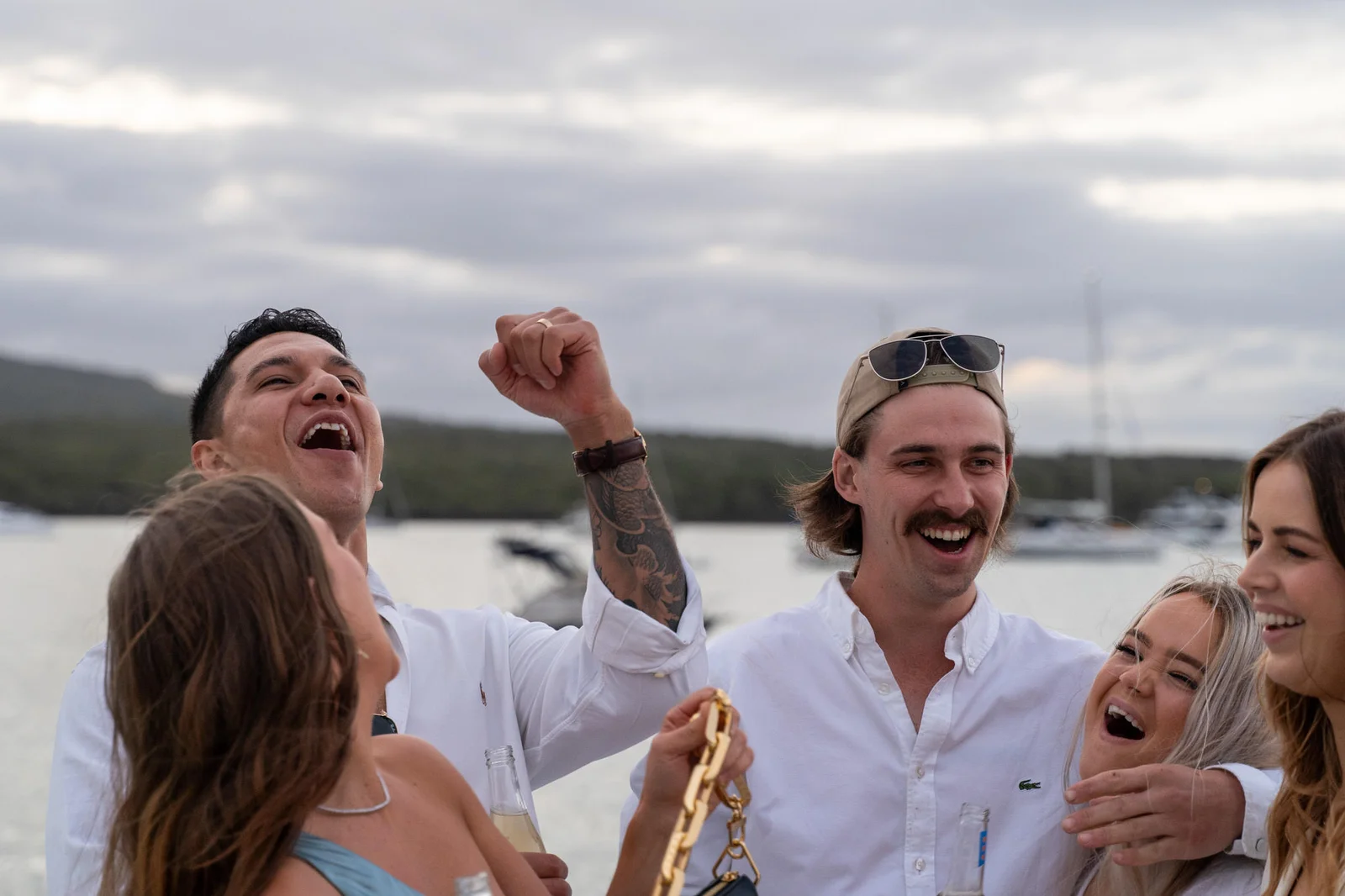 Group of young adults laughing outdoors