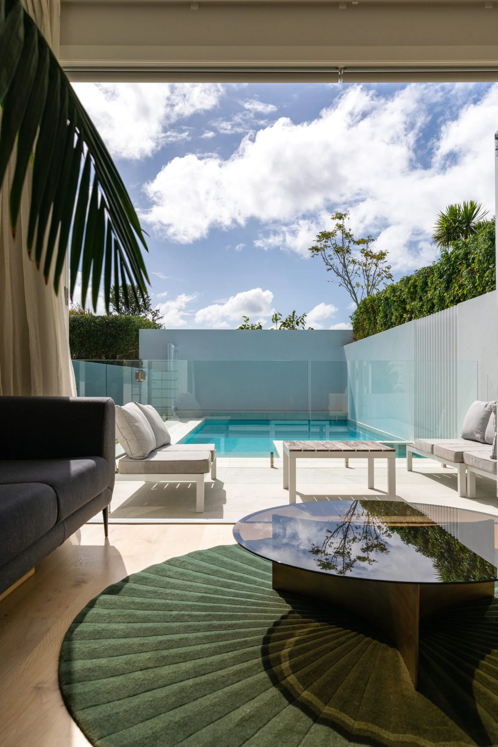 Modern outdoor living space with pool