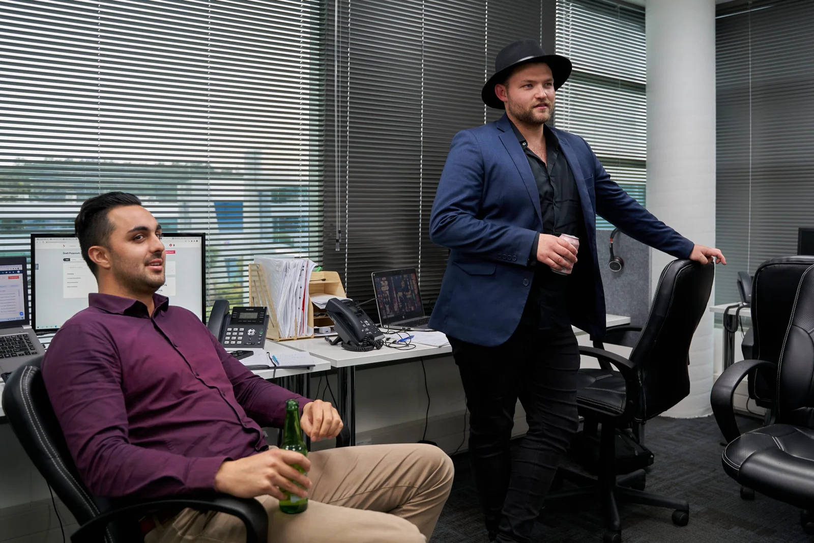 Two business professionals in office setting